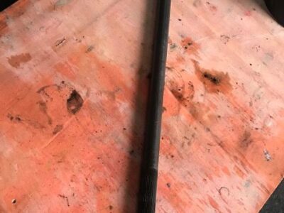 JCB 4CX - PÓŁOŚ MOSTU ~ TYŁ / L= 993 MM FREZY 33-33